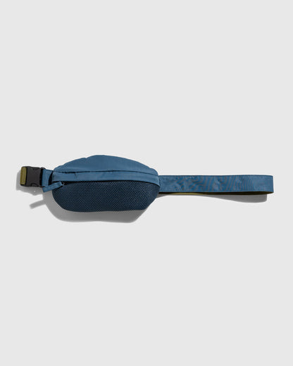 Deep Sea (Re)active™ 1L Fanny Pack (Back): Blue fanny pack back view, mesh panel, buckle clasp, olive-lined strap