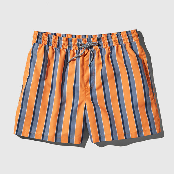 Orange Ochre Recycled Swim Trunk - 5" (Flat-lay): Orange and blue vertical striped shorts with elastic waistband and drawstring