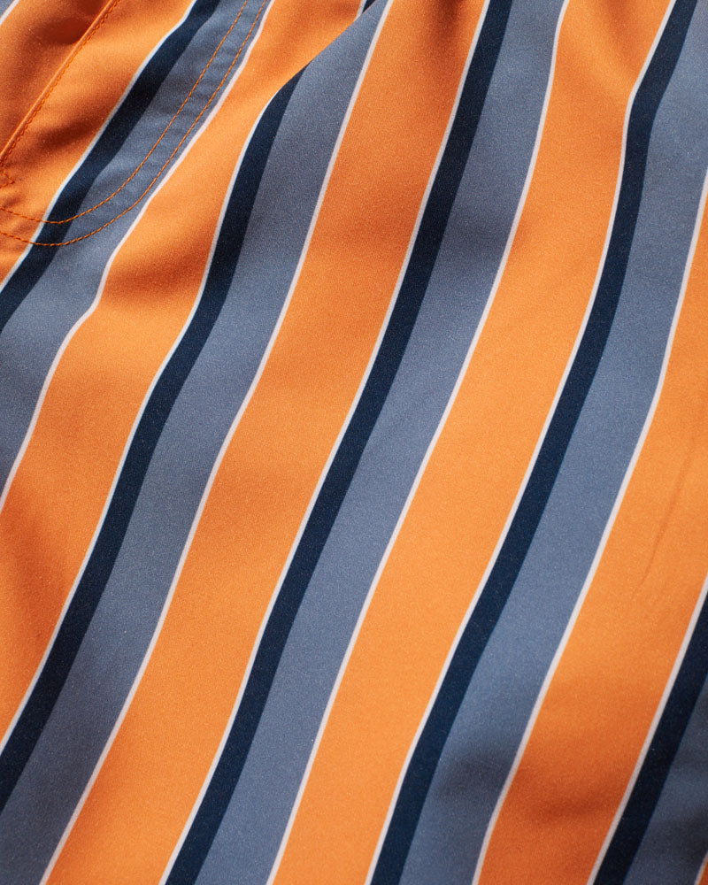 Orange Ochre Recycled Swim Trunk - 5" (Detail): Close-up of vertical stripes in orange, slate blue, navy, and white