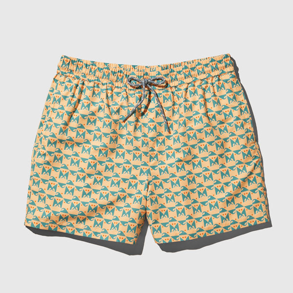 Buff Orange Recycled Swim Trunk - 5" (Flat-lay): Yellow swim trunks with teal geometric cat print and drawstring waist
